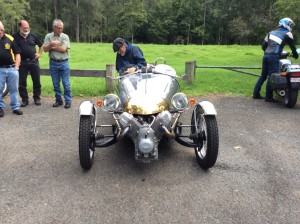The owner alights from a Moto-Guzzi powered three-wheeler which looks a little like the old British Morgan, but is in fact a recently constructed home-made vehicle.