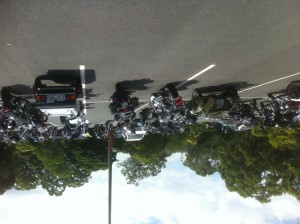 Here is a rear view of some of our bikes outside the conference in the car park. My bike is the green sidecar outfit on the left and Lyn's bike is Caspar, towing the trailer, on the right.