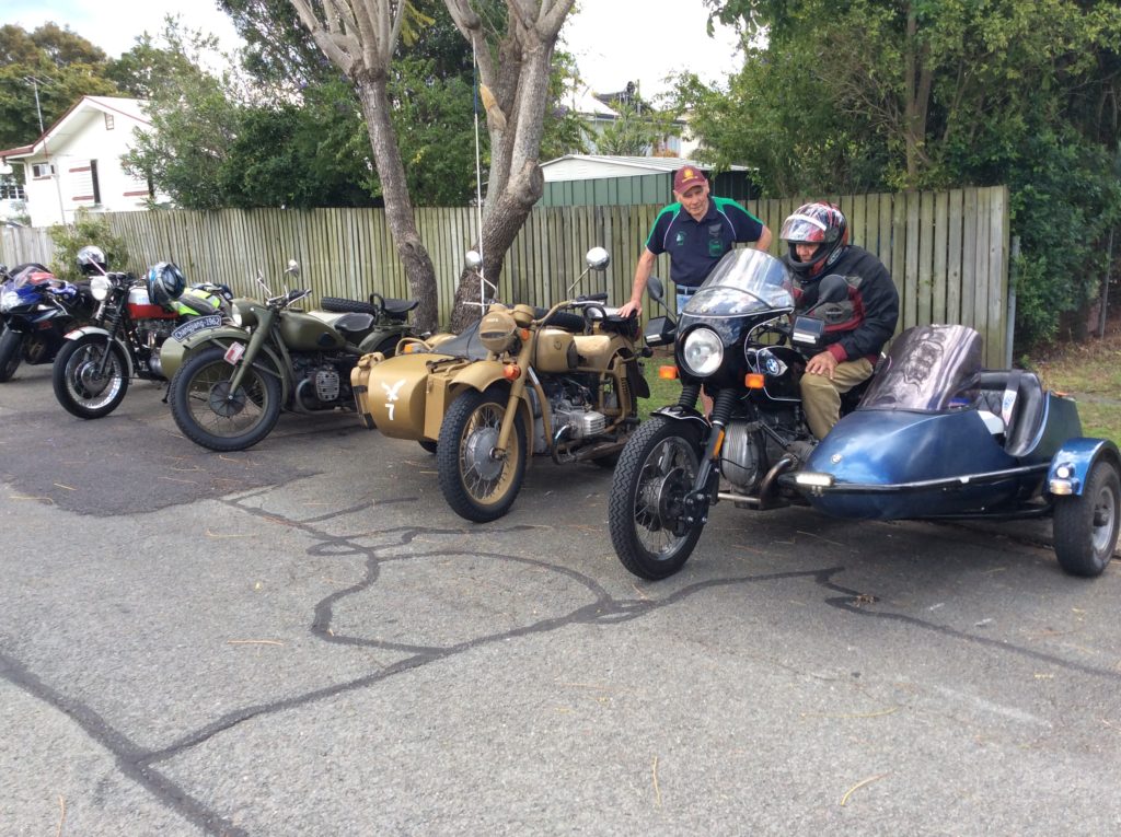Three sidecars are parked together in Stanley Street.